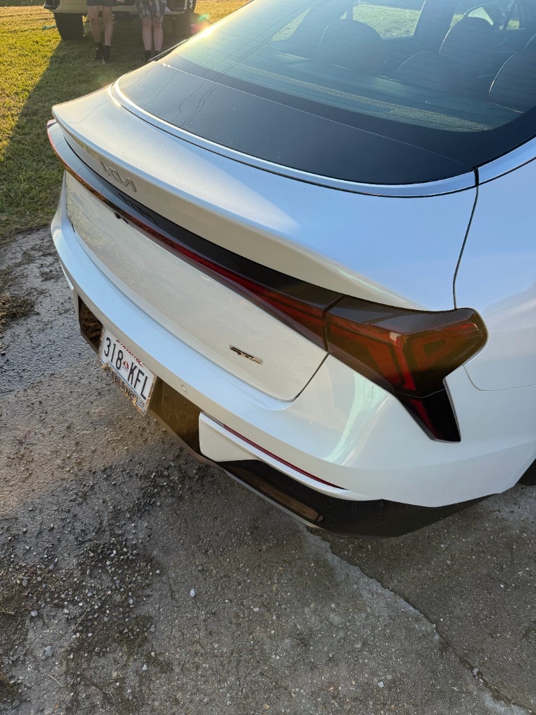 White Kia K5 GT-Line rear with smoked taillights after detailing